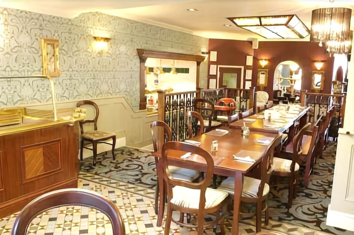 Imagen del bar/restaurante del Hotel The Globe And Crown. Foto 2
