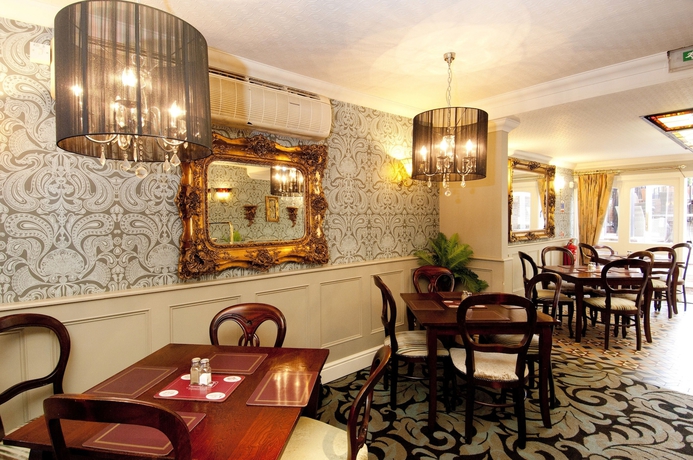 Imagen del bar/restaurante del Hotel The Globe And Crown. Foto 8