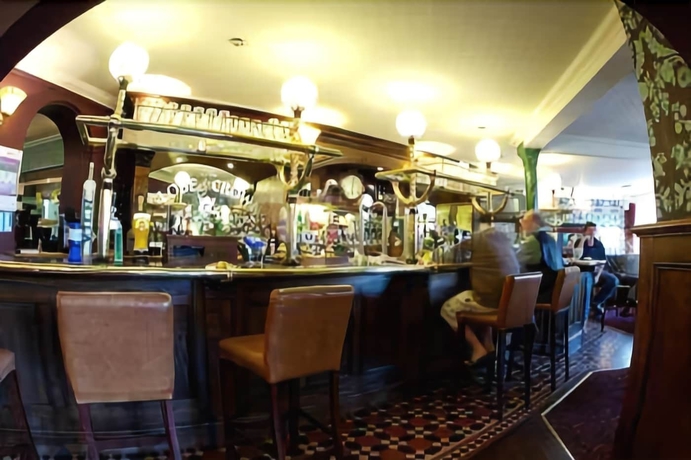 Imagen del bar/restaurante del Hotel The Globe And Crown. Foto 10