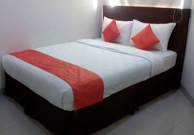 Imagen de la habitación del Hotel The Gloria Suites Jakarta. Foto 4