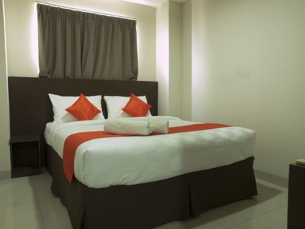 Imagen de la habitación del Hotel The Gloria Suites Jakarta. Foto 5