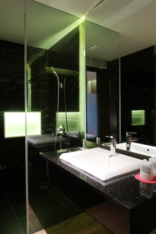 Imagen de la habitación del Hotel The Glory Gold. Foto 16