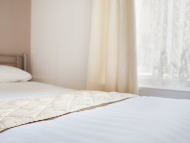 Imagen de la habitación del Hotel The Glyndale. Foto 9