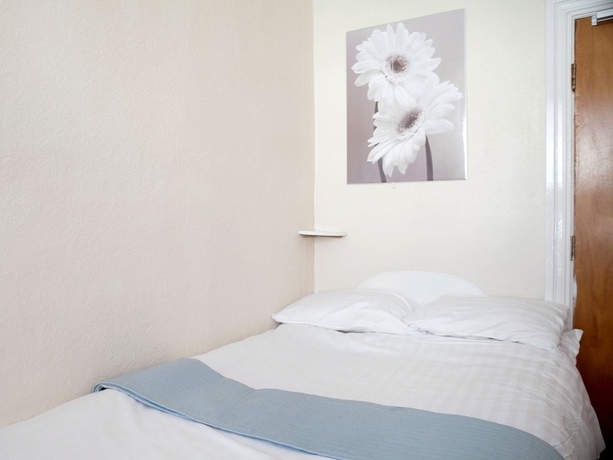 Imagen de la habitación del Hotel The Glyndale. Foto 12