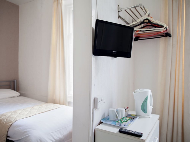 Imagen de la habitación del Hotel The Glyndale. Foto 16