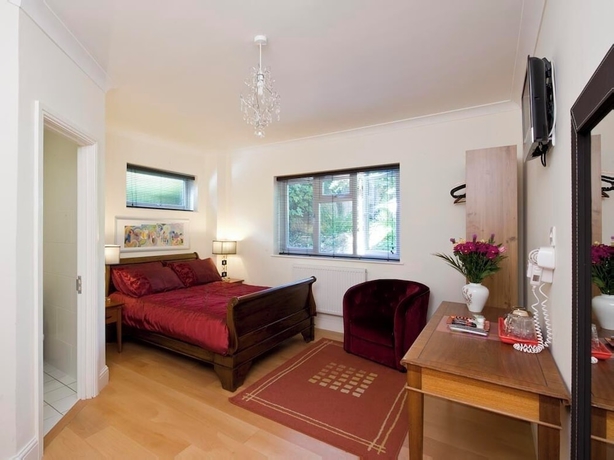 Imagen de la habitación del Hotel The Godalming. Foto 10