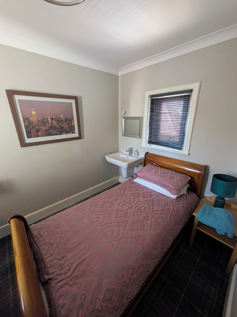 Imagen de la habitación del Hotel The Godalming. Foto 11
