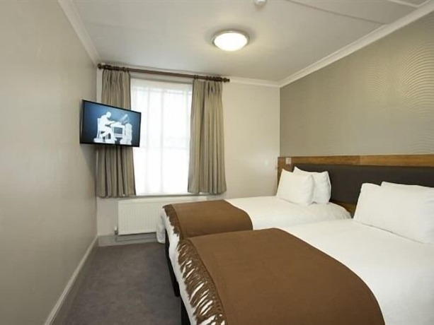 Imagen de la habitación del Hotel The Goddard Arms. Foto 12