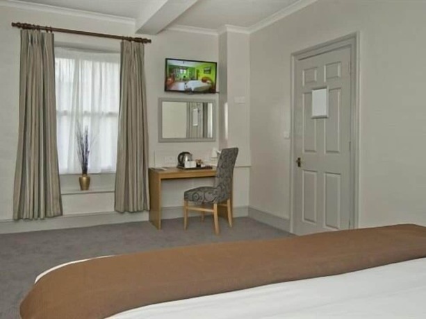 Imagen de la habitación del Hotel The Goddard Arms. Foto 16