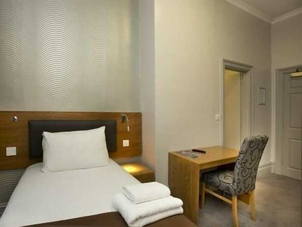 Imagen de la habitación del Hotel The Goddard Arms. Foto 18