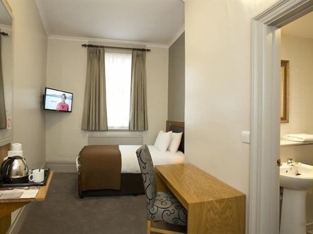 Imagen de la habitación del Hotel The Goddard Arms. Foto 19