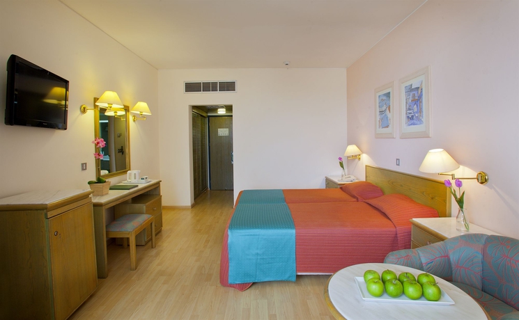 Imagen de la habitación del Hotel The Golden Coast Beach. Foto 3