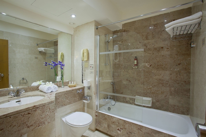 Imagen de la habitación del Hotel The Golden Coast Beach. Foto 4