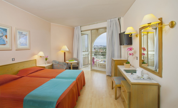 Imagen de la habitación del Hotel The Golden Coast Beach. Foto 5