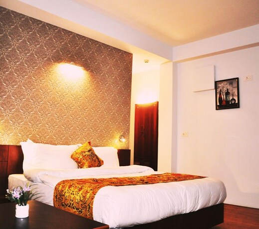 Imagen de la habitación del Hotel The Golden Crest. Foto 20