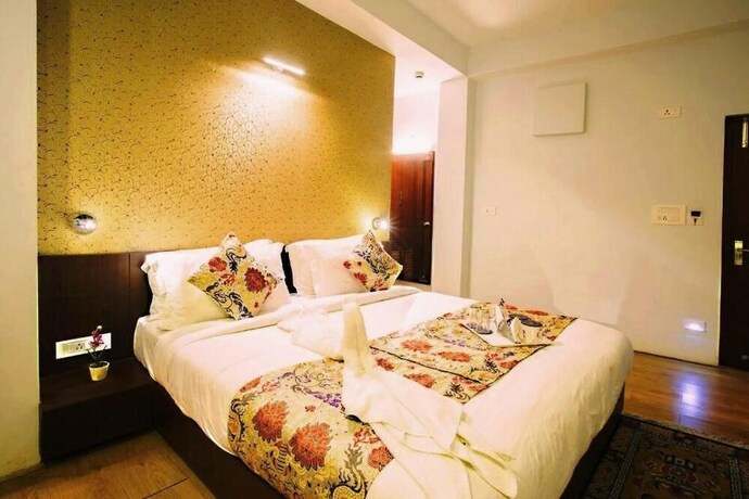 Imagen de la habitación del Hotel The Golden Crest. Foto 25