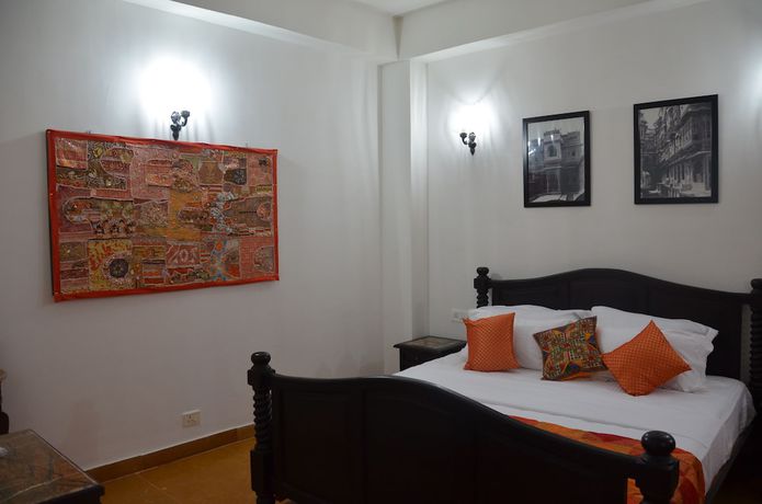 Imagen de la habitación del Hotel The Golden House. Foto 11