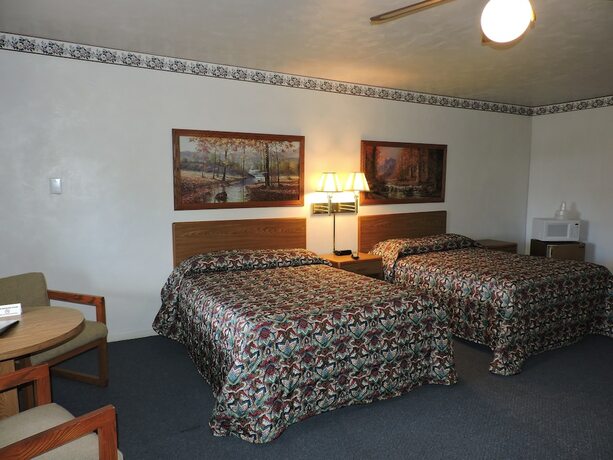 Imagen de la habitación del Hotel The Golden Inn. Foto 17