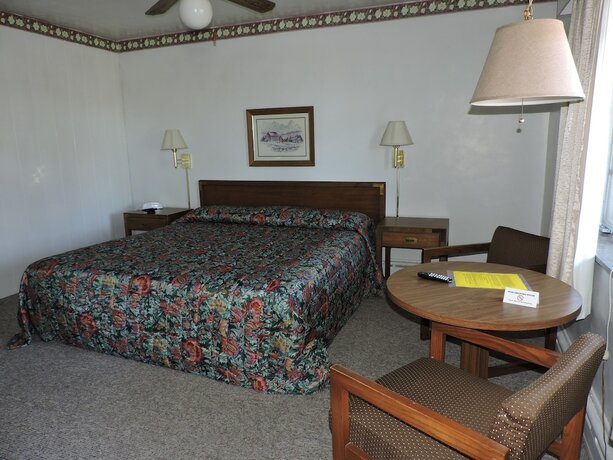 Imagen de la habitación del Hotel The Golden Inn. Foto 18