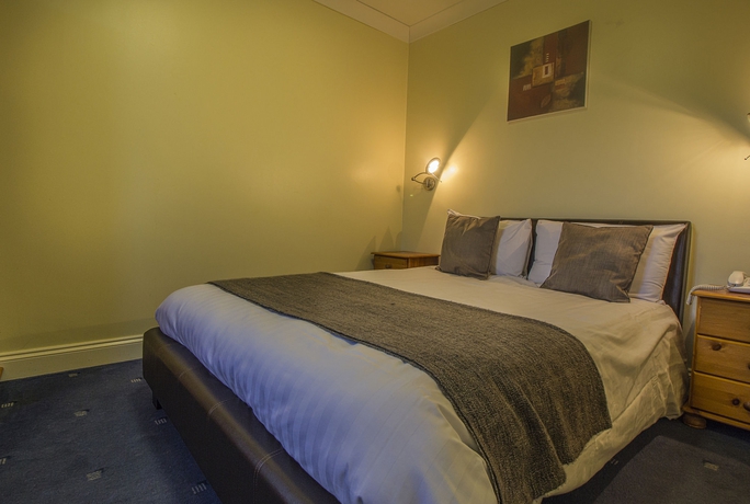 Imagen de la habitación del Hotel The Golden Lion. Foto 9