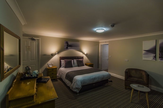 Imagen de la habitación del Hotel The Golden Lion. Foto 13