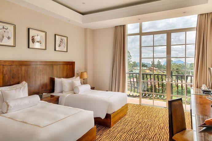 Imagen de la habitación del Hotel The Golden Ridge. Foto 2