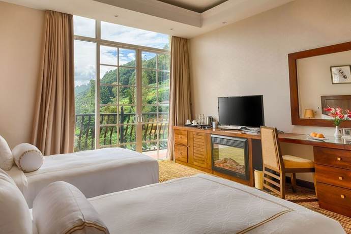 Imagen de la habitación del Hotel The Golden Ridge. Foto 5