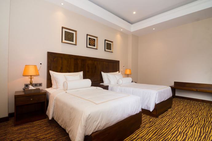 Imagen de la habitación del Hotel The Golden Ridge. Foto 18