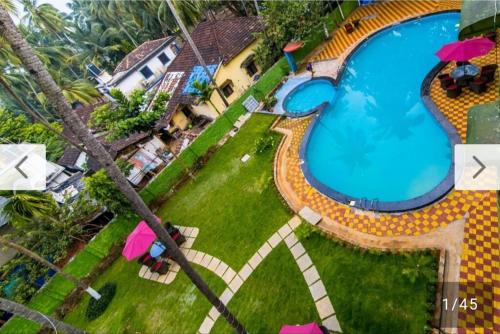 Imagen general del Hotel The Golden Shivam Resort - Big Swimming Pool Resort In Goa. Foto 2