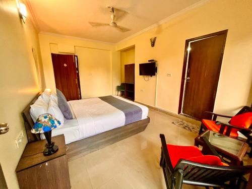 Imagen de la habitación del Hotel The Golden Shivam Resort - Big Swimming Pool Resort In Goa. Foto 20