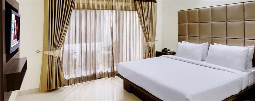 Imagen de la habitación del Hotel The Golden Suites and Spa. Foto 6