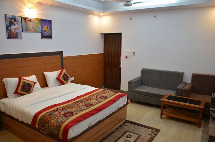 Imagen de la habitación del Hotel The Golden Sunrise, Patna. Foto 24