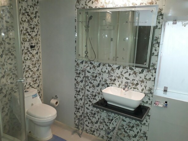 Imagen de la habitación del Hotel The Golden Sunrise, Patna. Foto 26
