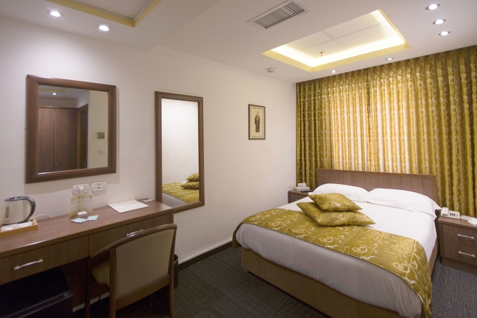 Imagen de la habitación del Hotel The Golden Walls. Foto 4