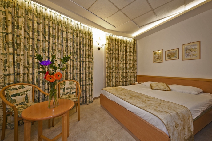 Imagen de la habitación del Hotel The Golden Walls. Foto 15