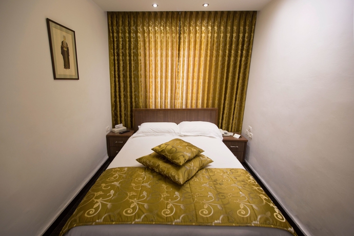 Imagen de la habitación del Hotel The Golden Walls. Foto 17