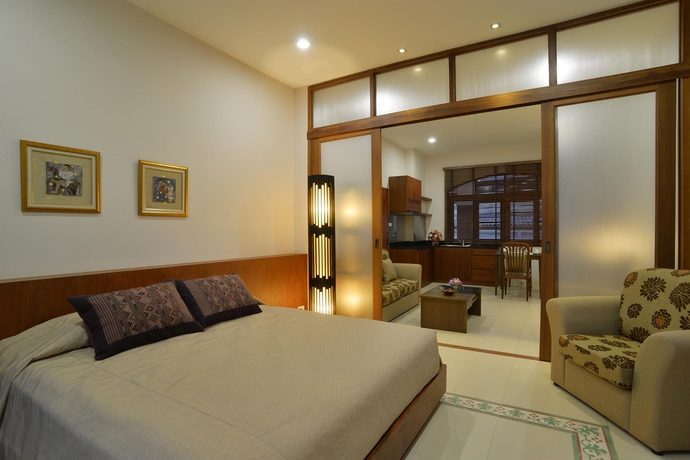 Imagen de la habitación del Hotel The Golden Wells Residence. Foto 9