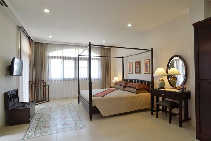 Imagen de la habitación del Hotel The Golden Wells Residence. Foto 11