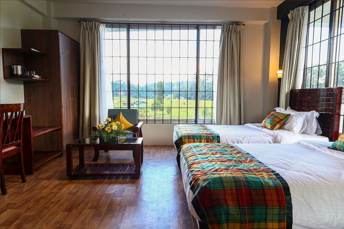 Imagen de la habitación del Hotel The Golf Retreat Shillong. Foto 3