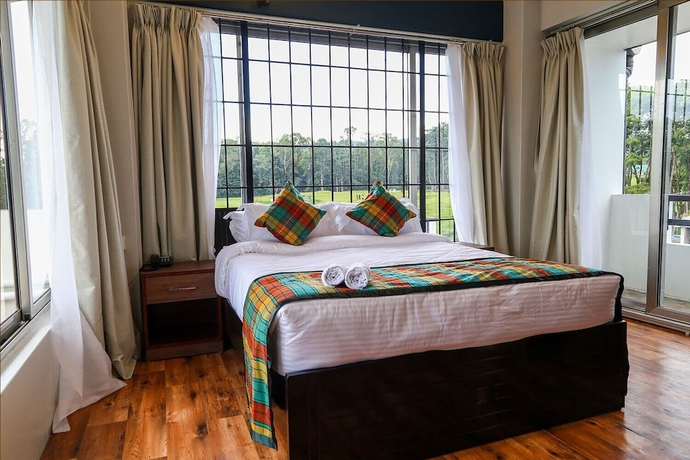 Imagen de la habitación del Hotel The Golf Retreat Shillong. Foto 5