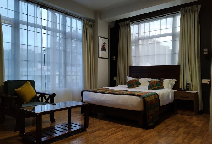 Imagen de la habitación del Hotel The Golf Retreat Shillong. Foto 8