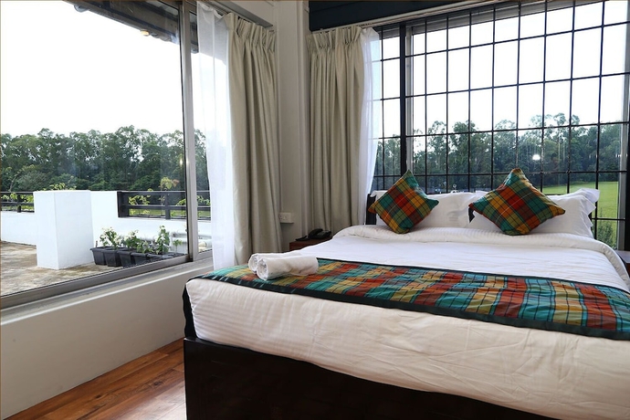 Imagen de la habitación del Hotel The Golf Retreat Shillong. Foto 11