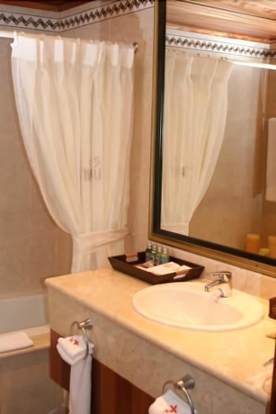 Imagen de la habitación del Hotel The Golf Suites. Foto 4