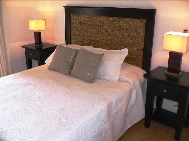 Imagen de la habitación del Hotel The Golf Suites. Foto 7