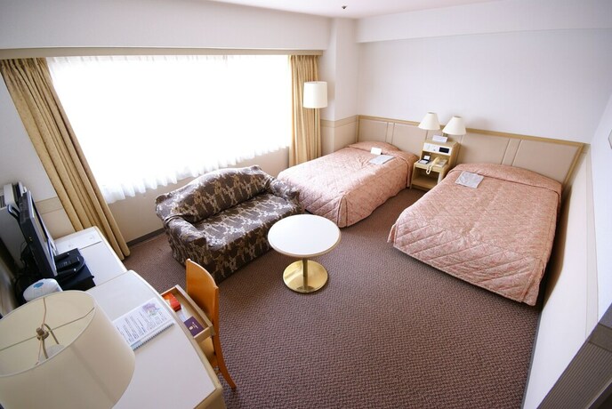Imagen de la habitación del Hotel The Gotembakan. Foto 13