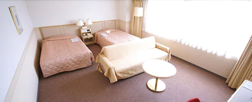 Imagen de la habitación del Hotel The Gotembakan. Foto 15
