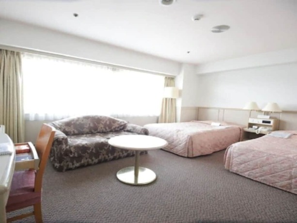 Imagen de la habitación del Hotel The Gotembakan. Foto 17