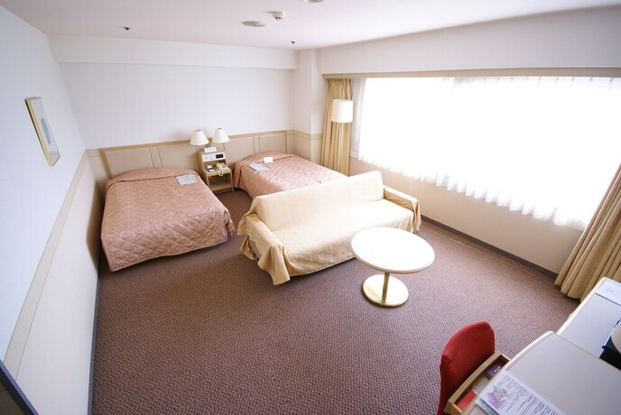 Imagen de la habitación del Hotel The Gotembakan. Foto 19