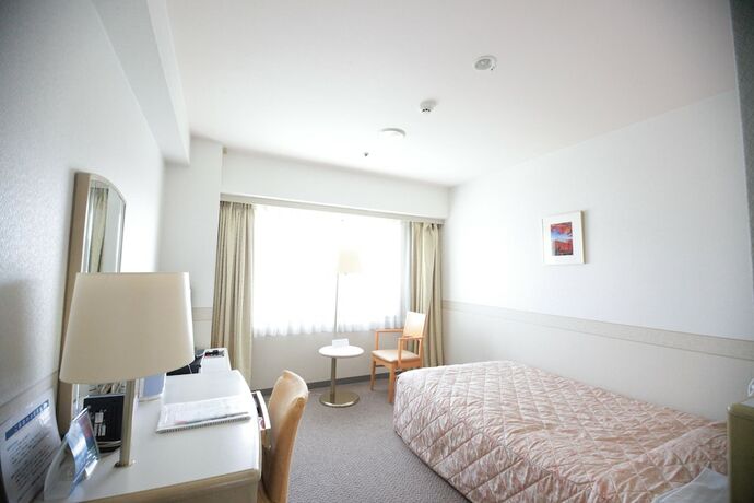 Imagen de la habitación del Hotel The Gotembakan. Foto 20