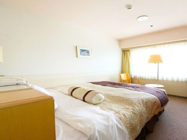 Imagen de la habitación del Hotel The Gotembakan. Foto 21